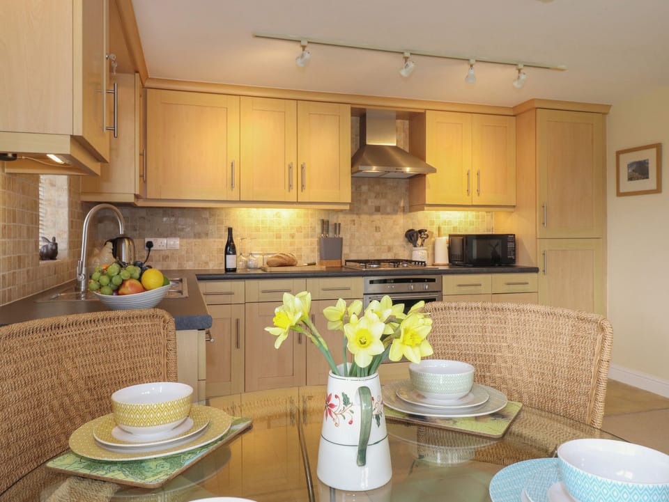 Fridge, dishwasher, toaster, cookware/dishes/utensils