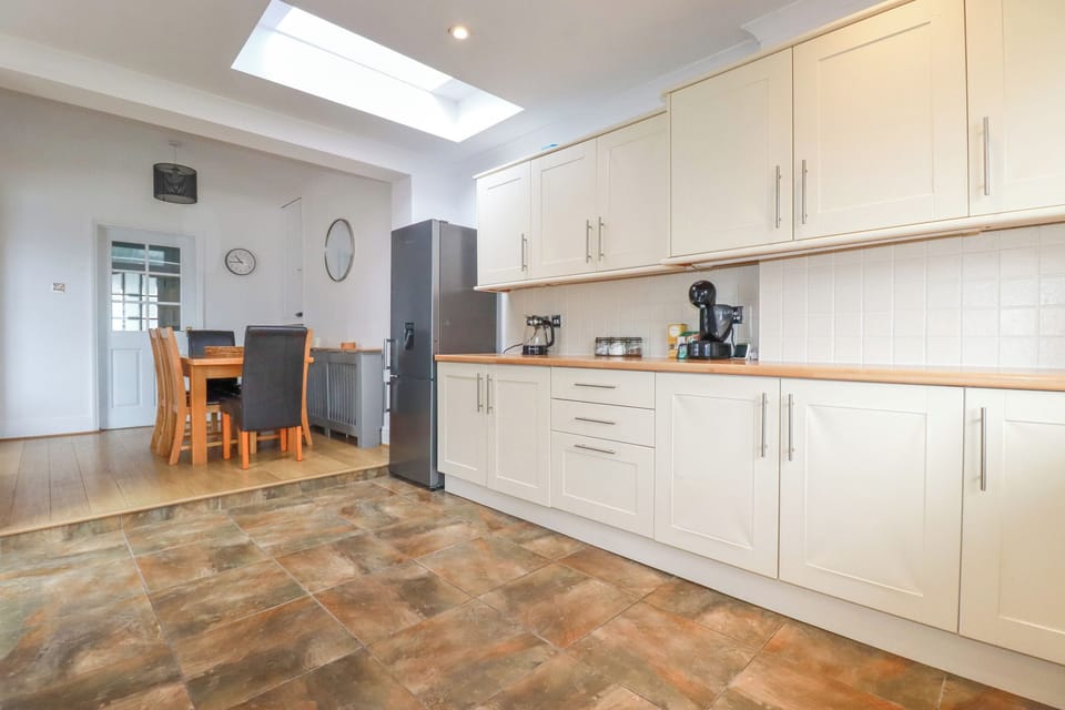 Fridge, dishwasher, electric kettle, cookware/dishes/utensils