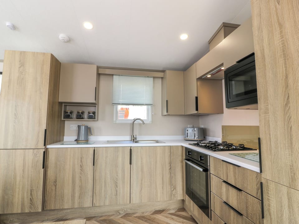 Fridge, electric kettle, toaster, cookware/dishes/utensils
