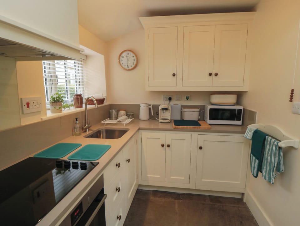 Fridge, electric kettle, toaster, cookware/dishes/utensils