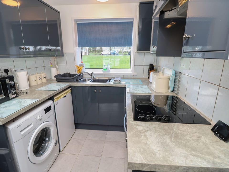 Fridge, electric kettle, toaster, cookware/dishes/utensils