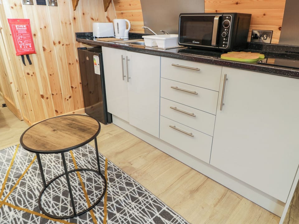 Fridge, electric kettle, toaster, cookware/dishes/utensils