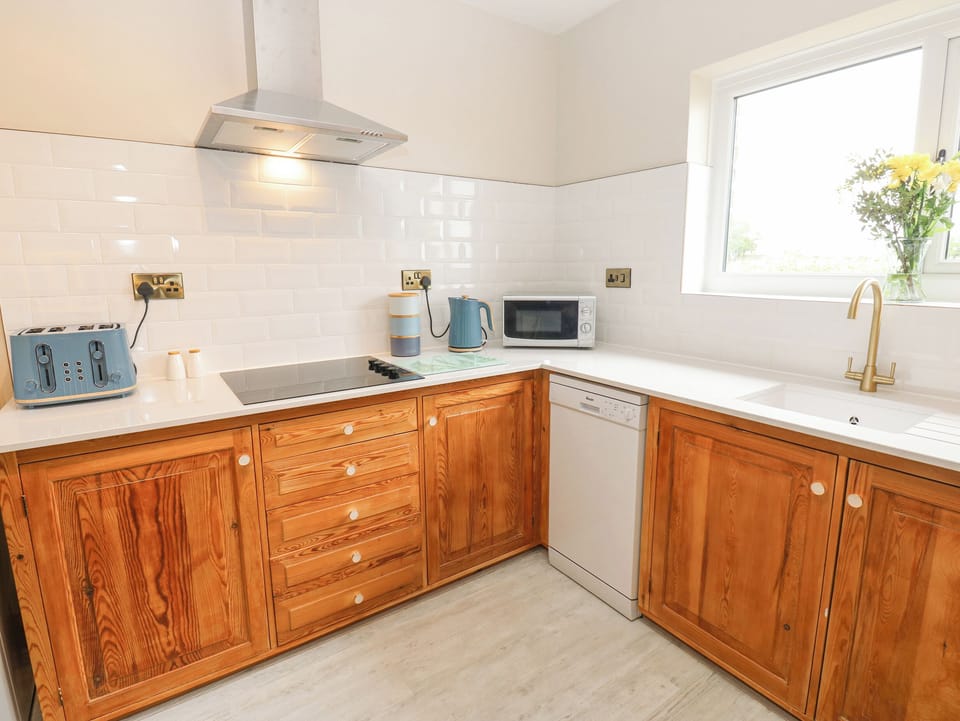 Fridge, dishwasher, electric kettle, cookware/dishes/utensils