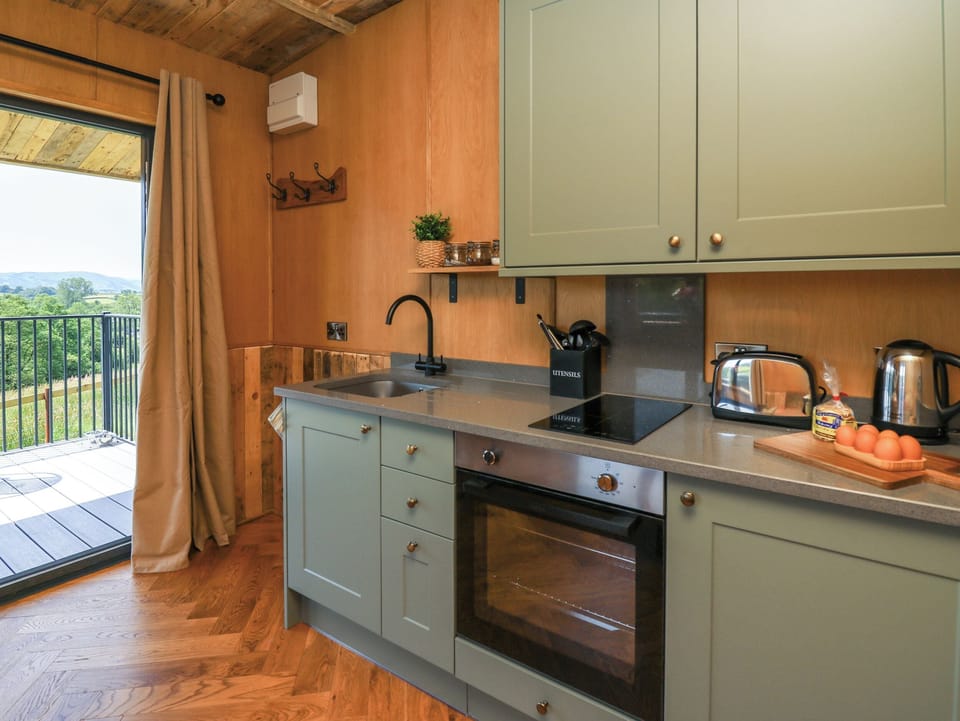 Fridge, electric kettle, toaster, cookware/dishes/utensils