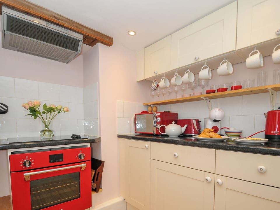 Fridge, electric kettle, toaster, cookware/dishes/utensils