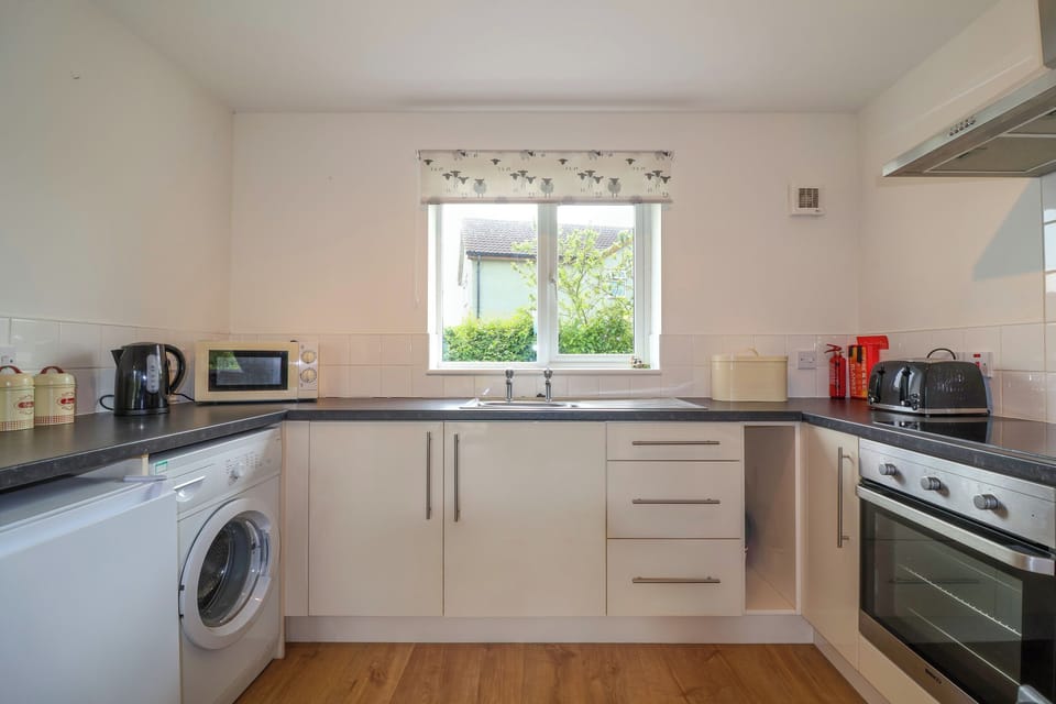 Fridge, electric kettle, toaster, cookware/dishes/utensils