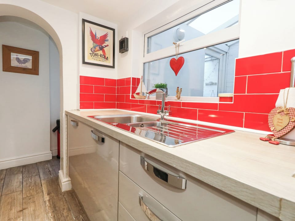 Fridge, electric kettle, cookware/dishes/utensils