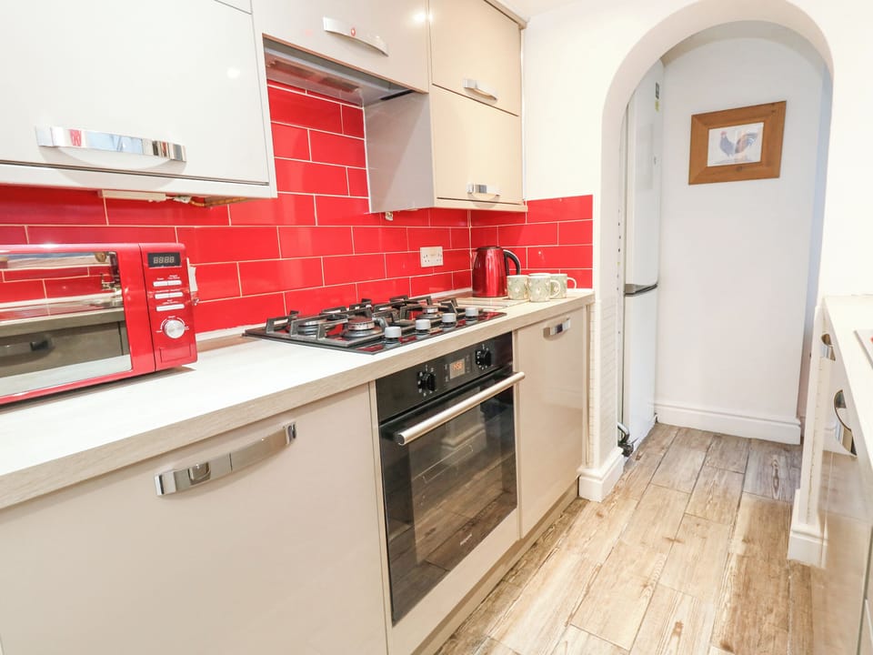 Fridge, electric kettle, cookware/dishes/utensils