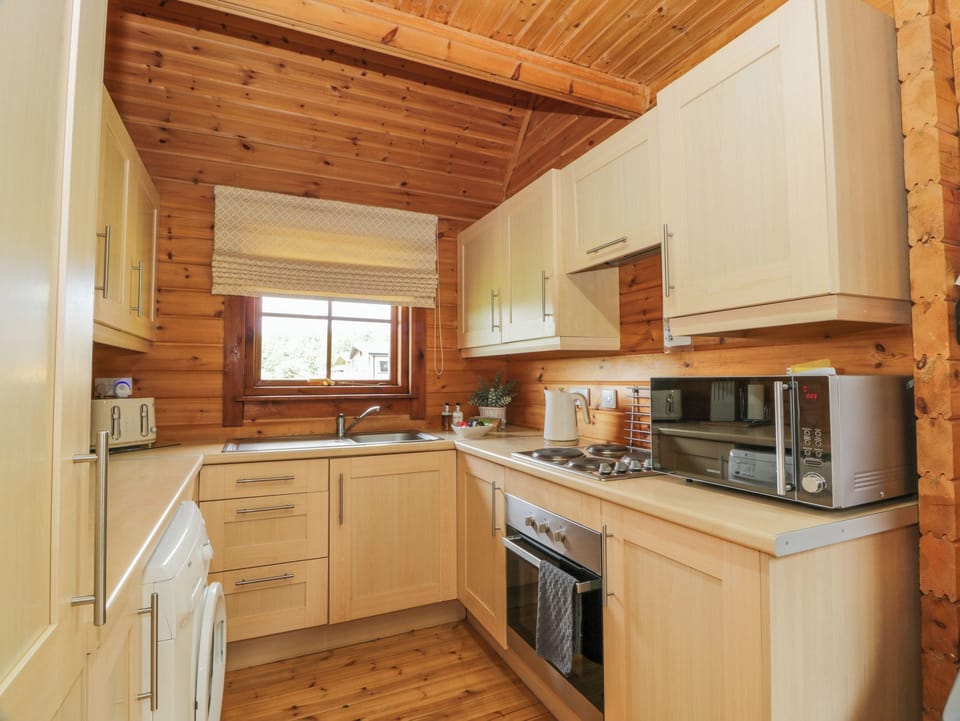 Fridge, electric kettle, toaster, cookware/dishes/utensils
