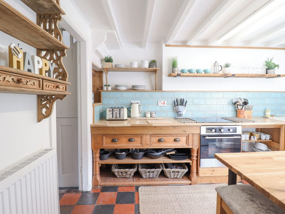 Fridge, electric kettle, toaster, cookware/dishes/utensils