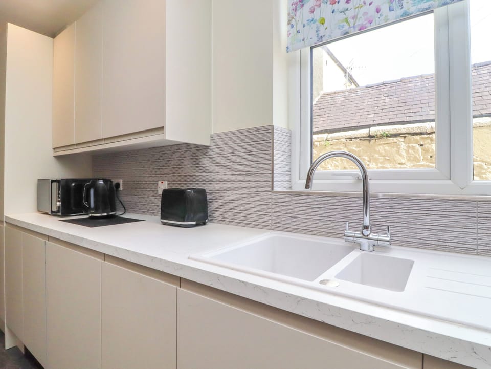 Fridge, dishwasher, toaster, cookware/dishes/utensils