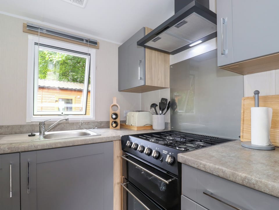 Fridge, electric kettle, toaster, cookware/dishes/utensils