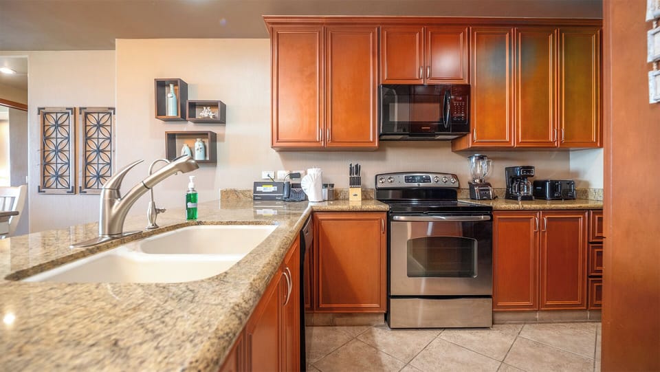 THe kitchen is spacious, and really full of the appliances and cookware you want.