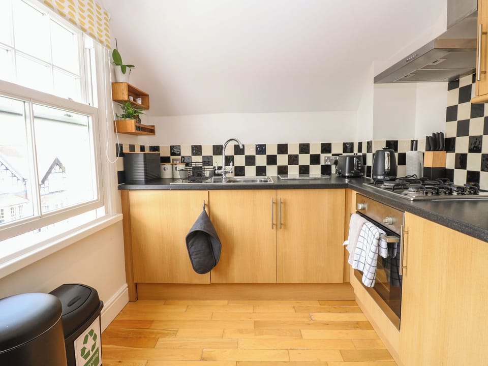 Fridge, electric kettle, toaster, cookware/dishes/utensils