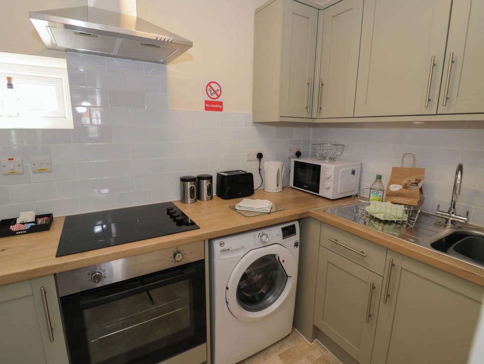 Fridge, toaster, cookware/dishes/utensils