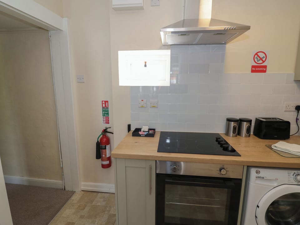 Fridge, toaster, cookware/dishes/utensils