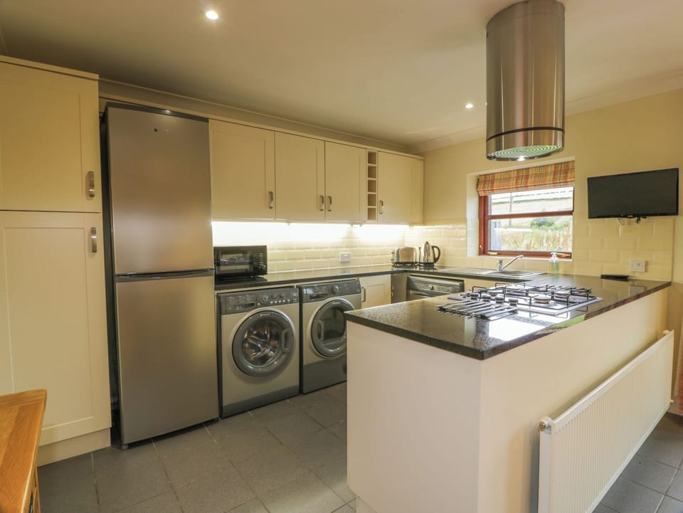 Fridge, dishwasher, electric kettle, cookware/dishes/utensils