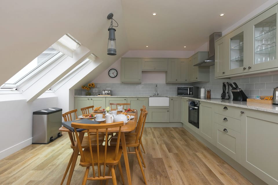 Fridge, dishwasher, electric kettle, cookware/dishes/utensils