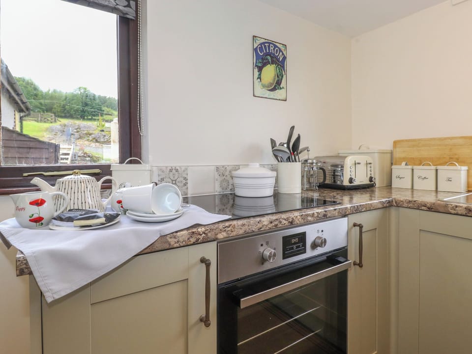 Fridge, electric kettle, toaster, cookware/dishes/utensils