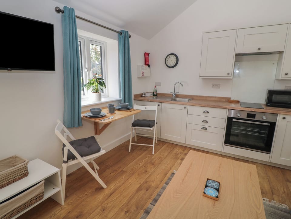 Fridge, electric kettle, toaster, cookware/dishes/utensils