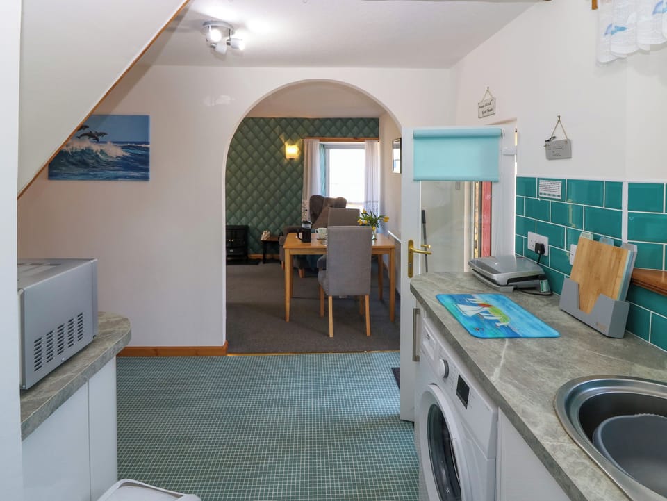Fridge, electric kettle, toaster, cookware/dishes/utensils