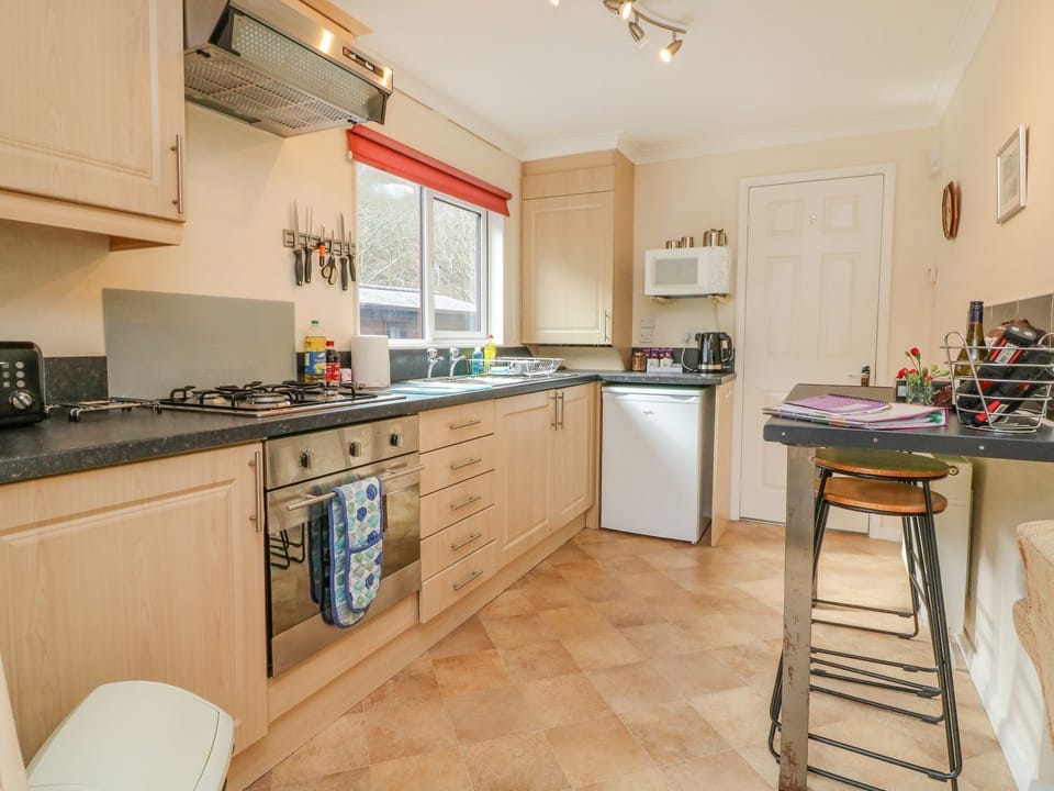 Fridge, electric kettle, cookware/dishes/utensils