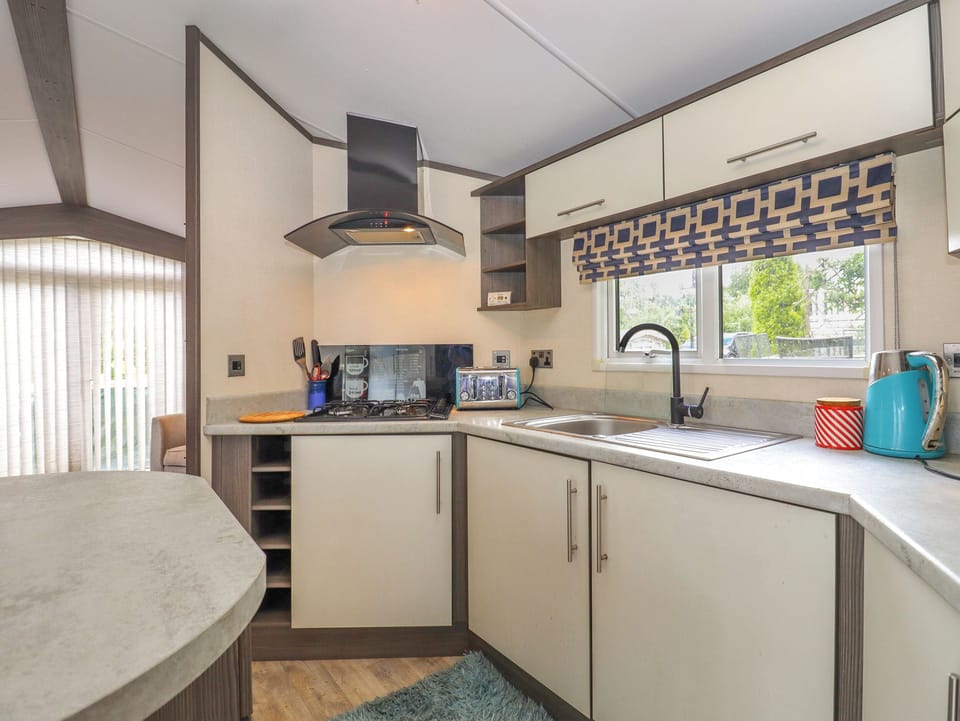 Fridge, electric kettle, toaster, cookware/dishes/utensils