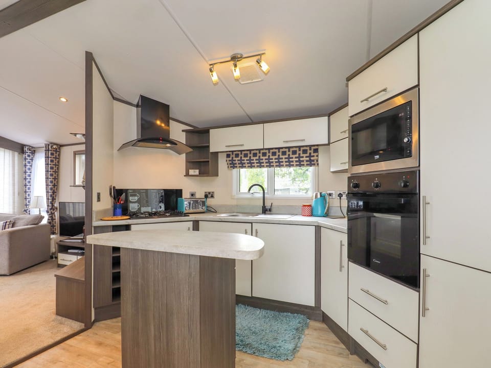 Fridge, electric kettle, toaster, cookware/dishes/utensils