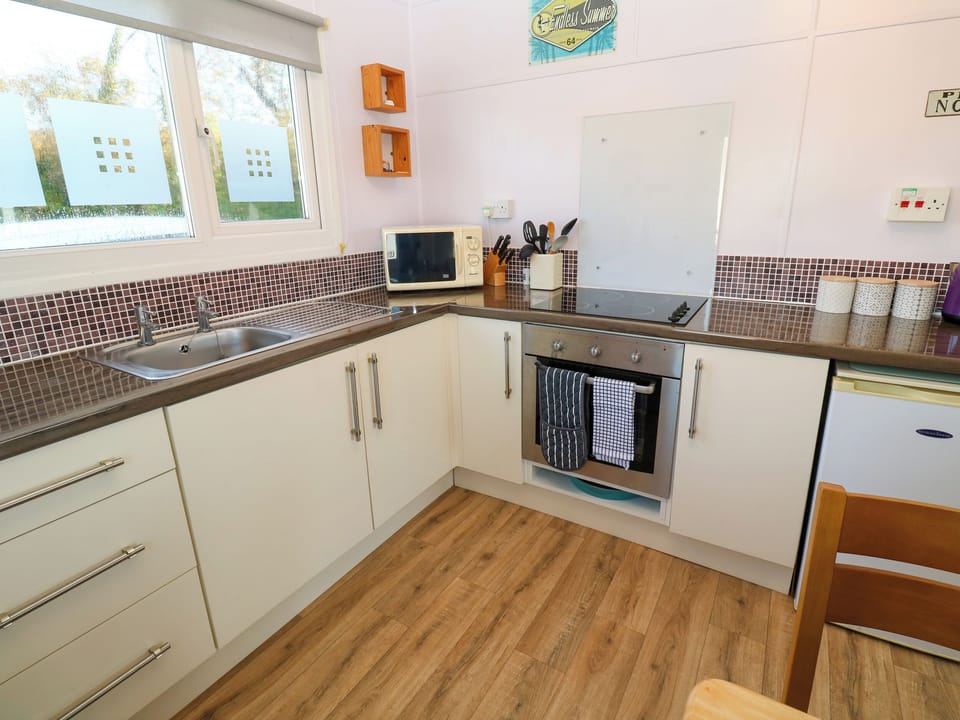 Fridge, electric kettle, toaster, cookware/dishes/utensils