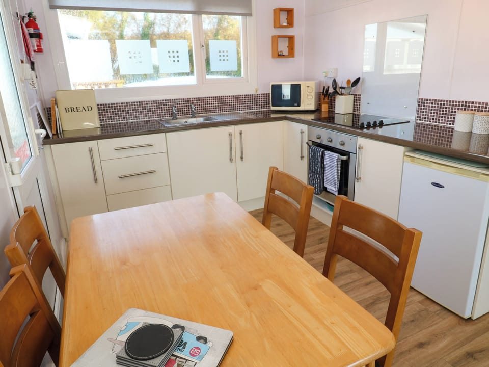 Fridge, electric kettle, toaster, cookware/dishes/utensils