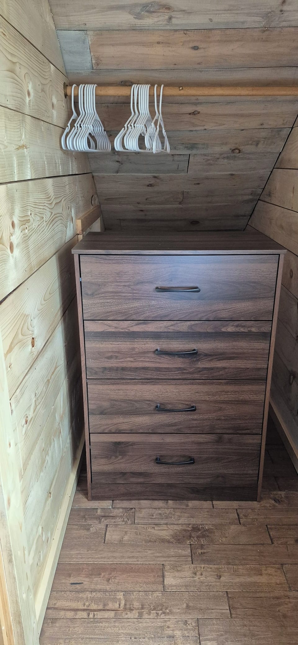 Closet and dresser in the bedroom.