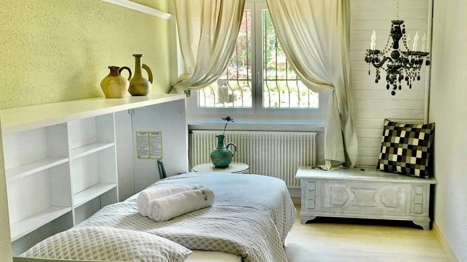 bedroom with folding bed