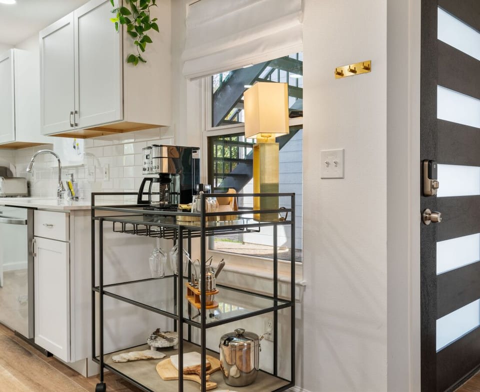 Brew brilliance! Coffee station awaits with chic cart flair.