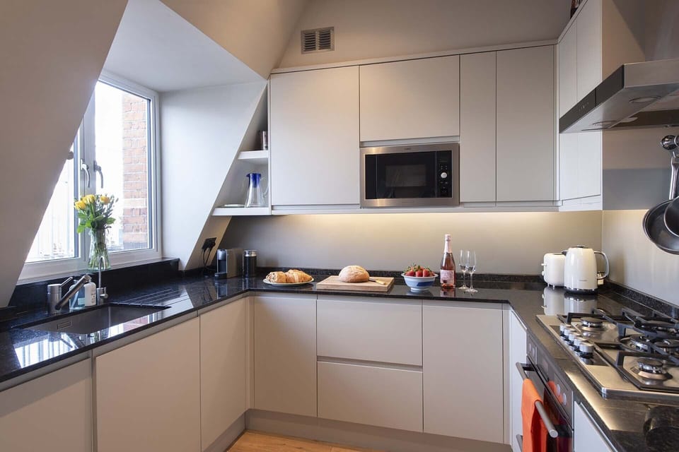 Fully-equipped kitchen next to the dining area.