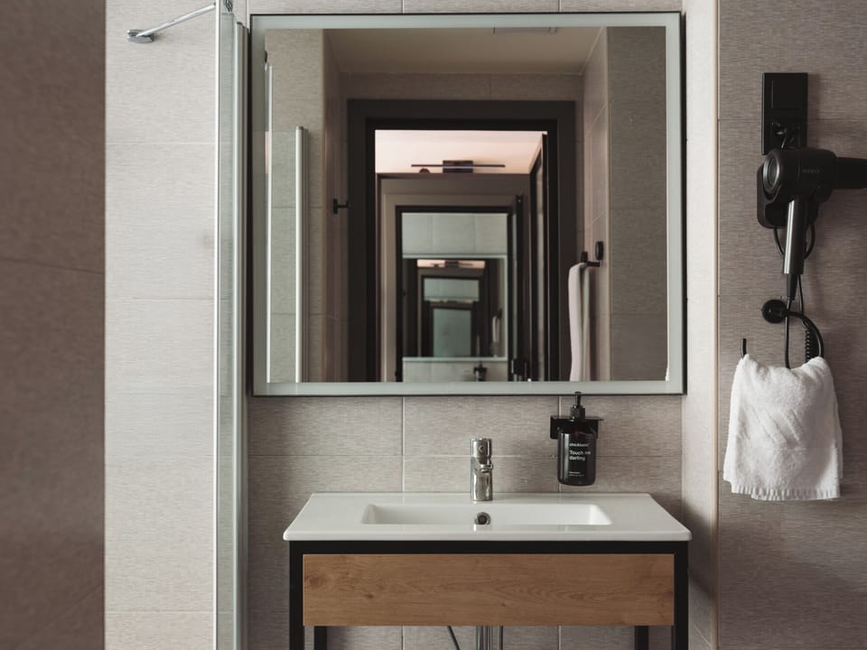 Standard Double | Bathroom | Shower, hair dryer, towels, soap