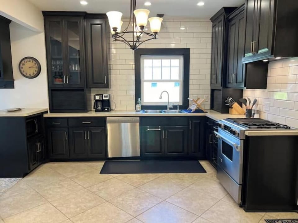 Elegant kitchen that is fully loaded.  
