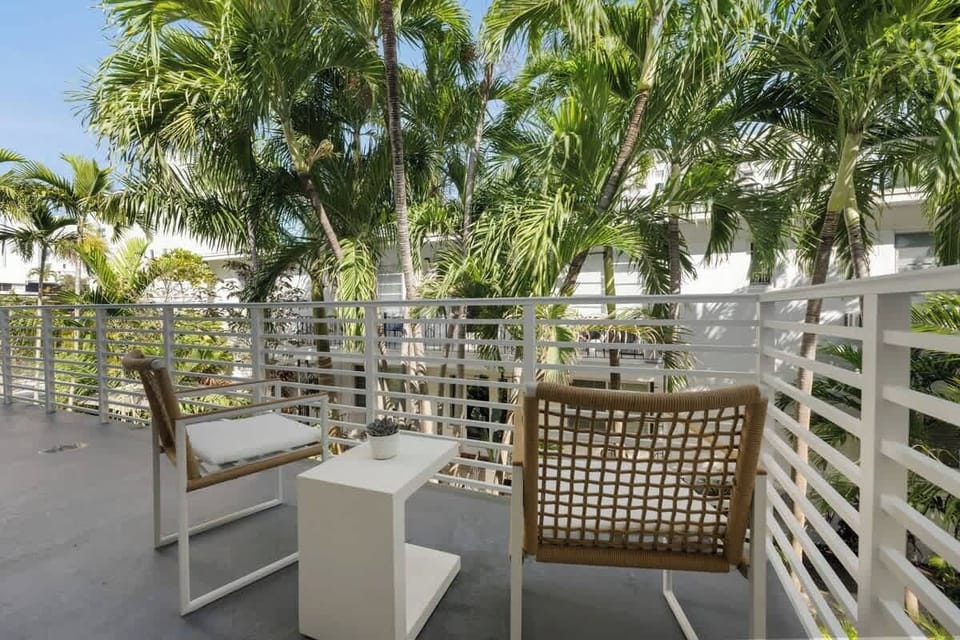 Private balcony offering serene views—a perfect spot to unwind and enjoy the outdoors.
