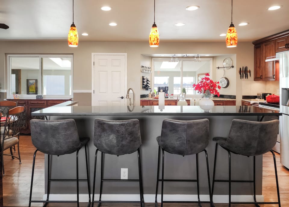 The large kitchen island has 4 bar seats.