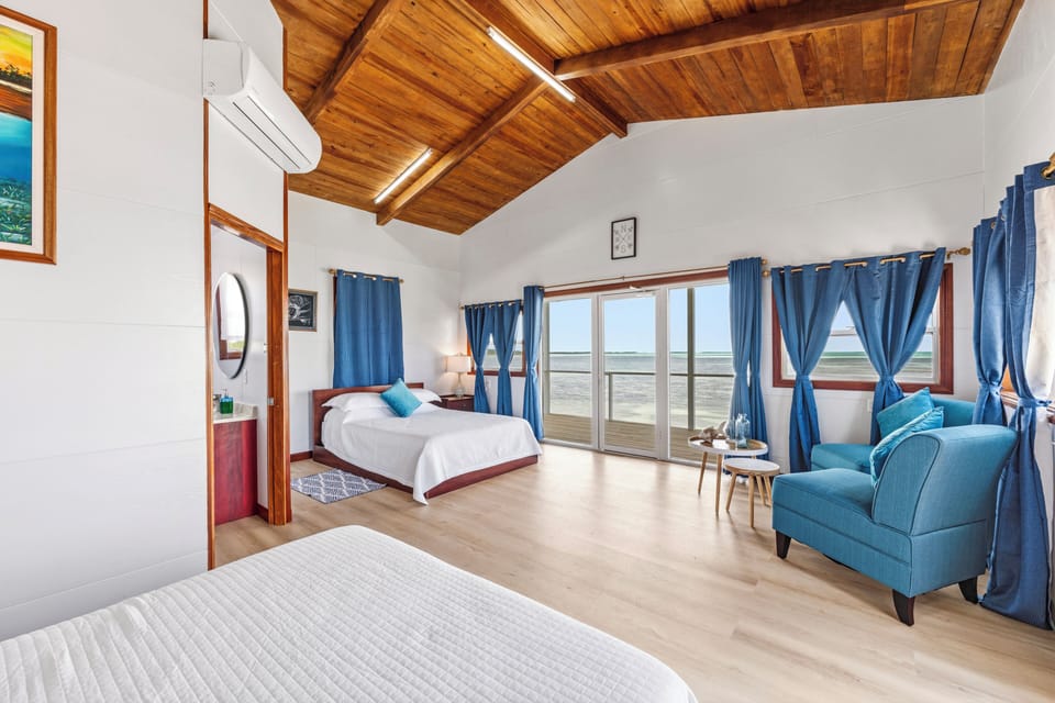 Superior Cabin, 2 Queen Beds, Ocean View | Blackout drapes, free WiFi, bed sheets