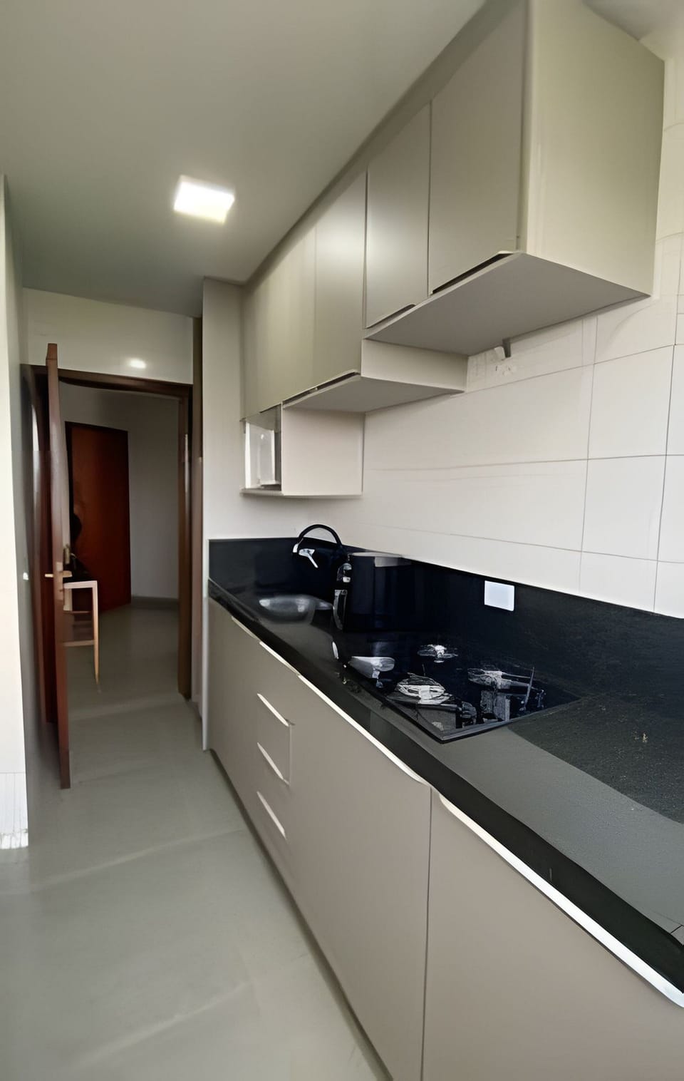 Comfort Apartment | Private kitchen | Microwave, stovetop, cookware/dishes/utensils