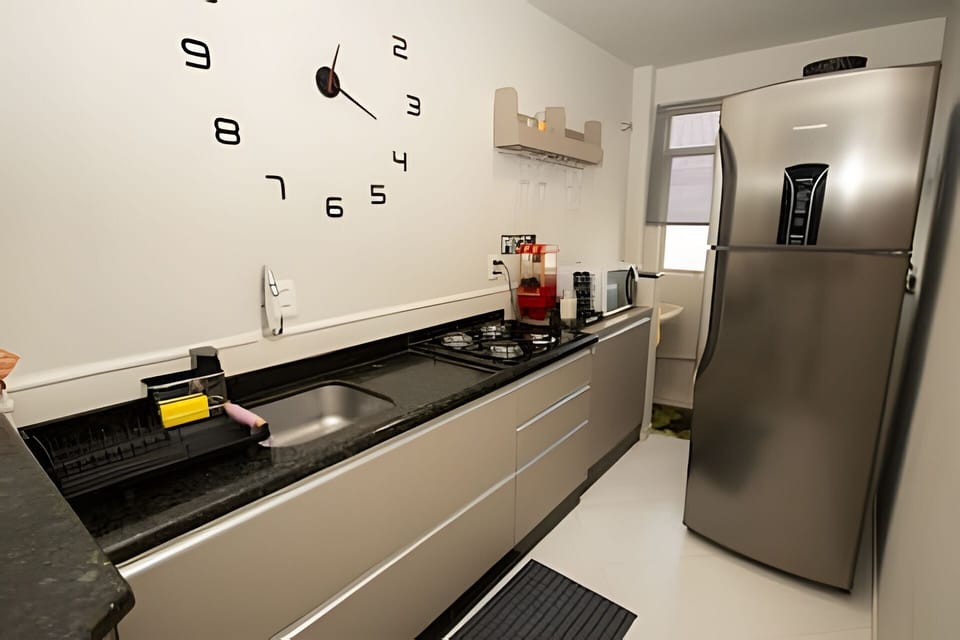 Apartment | Private kitchen | Full-size fridge, microwave, stovetop, cookware/dishes/utensils