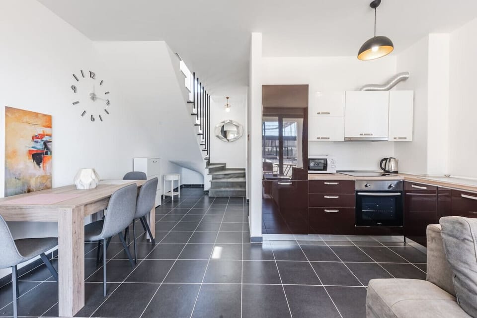 Fully-equipped kitchen and dining area