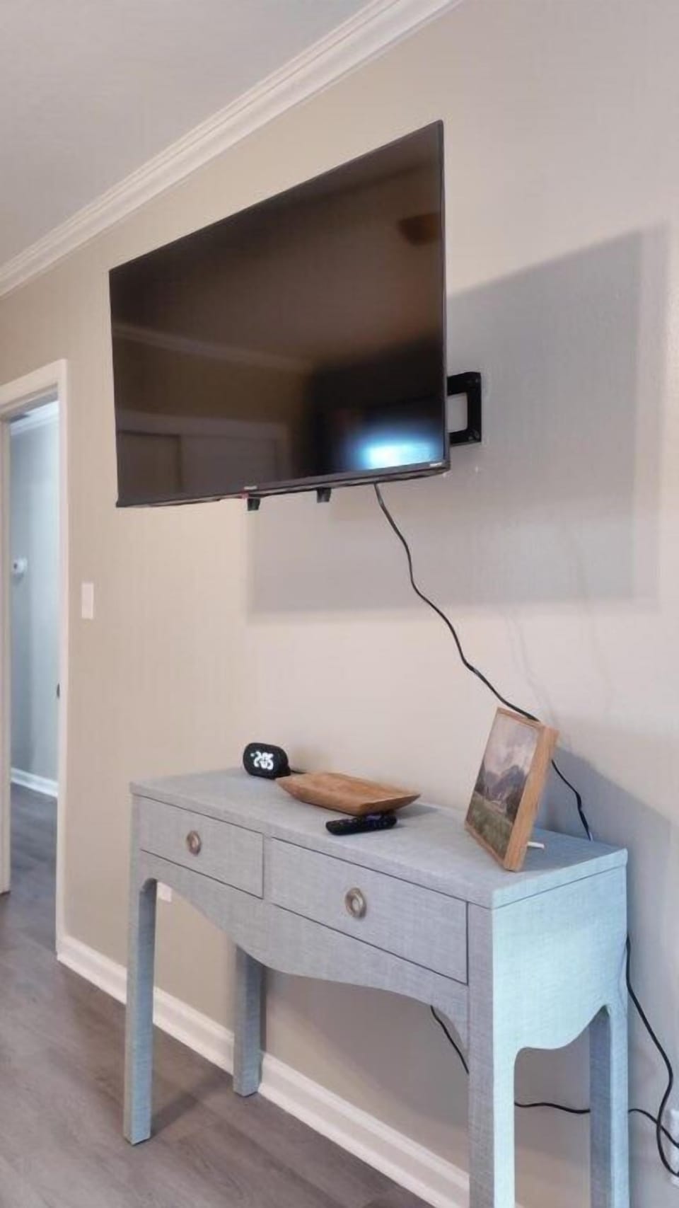 Charming 4BR/2BA Home in Bainbridge - master bedroom king bed with smart tv