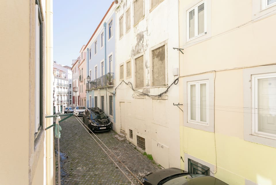 Our apartment overlooks a quiet, charming Lisbon street. Explore the area!