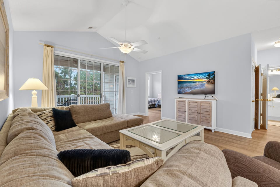 Comfortable seating area with TV and open layout, ideal for unwinding after a day out.