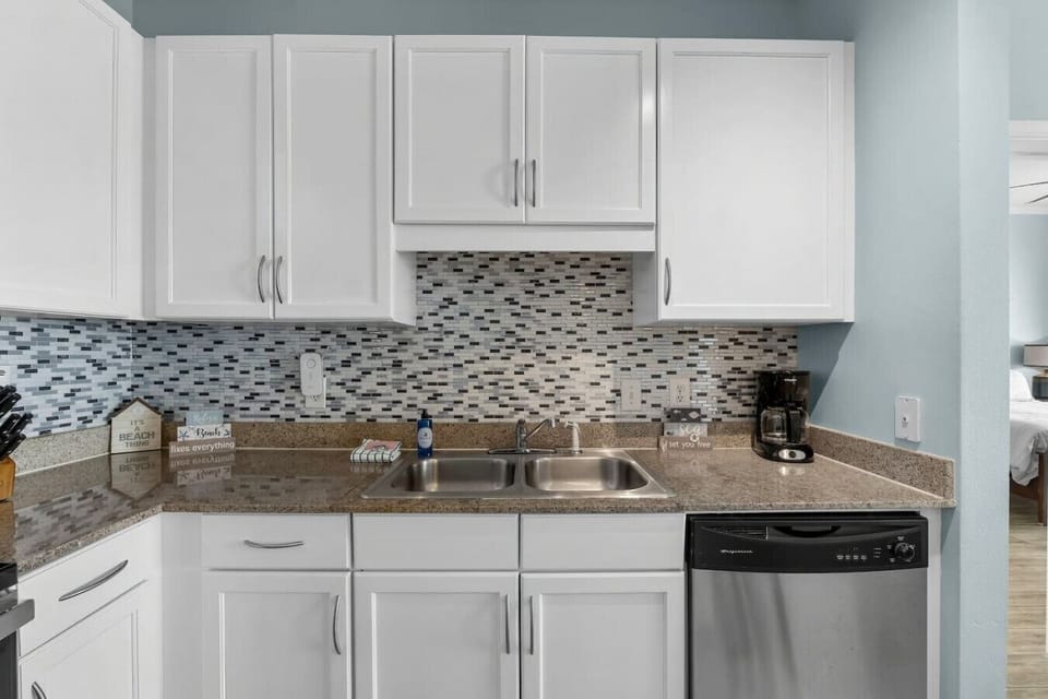 Fully Stocked Kitchen with Ocean Views, Island Bar Seating and Drip Coffee Maker