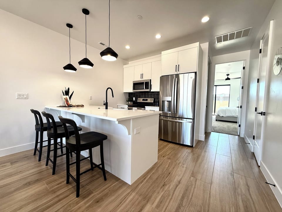 Sleek and modern kitchen at Holiday H1 at Catori in Kanab, UT. Fully equipped for your luxury condo getaway!