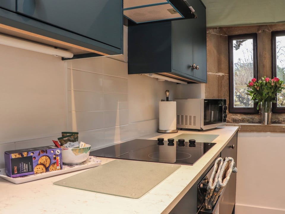 Fridge, electric kettle, toaster, cookware/dishes/utensils