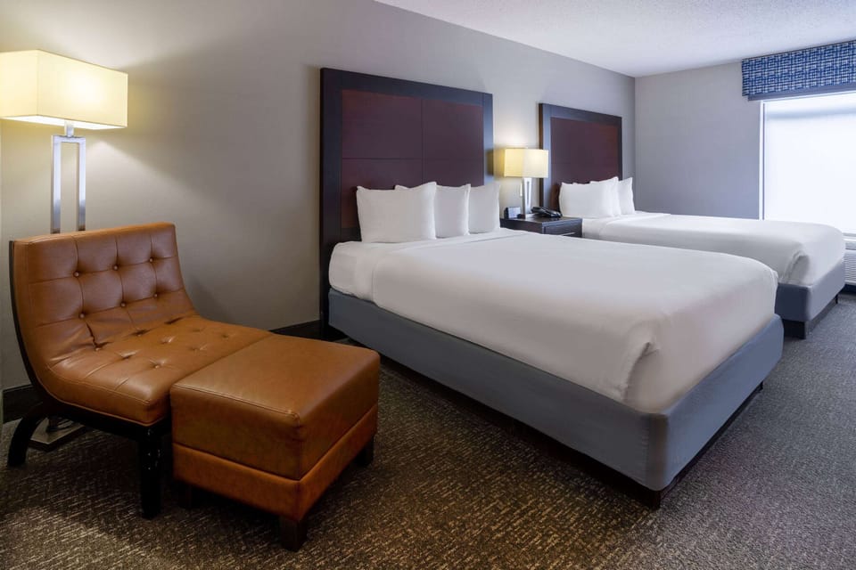 Room, 2 Queen Beds, Non Smoking | In-room safe, desk, laptop workspace, blackout drapes