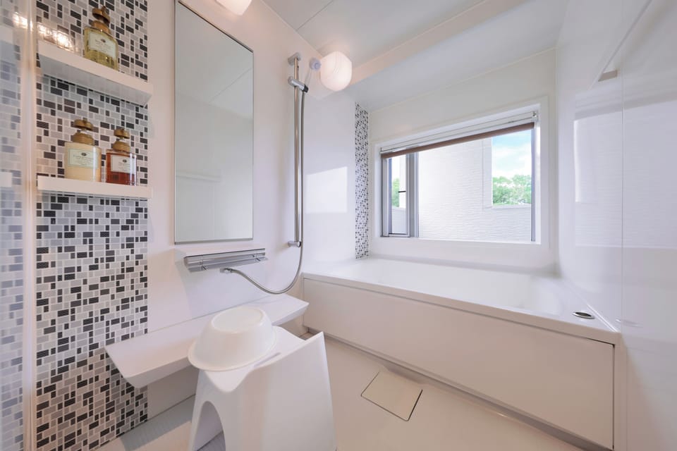 Annex Yuunagi | Bathroom | Hair dryer, towels, toilet paper